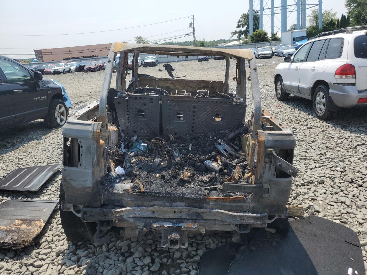 2021 Jeep Wrangler VIN 1C4JJXR61MW745344 Copart auction photo, burn damage thumbnail 6