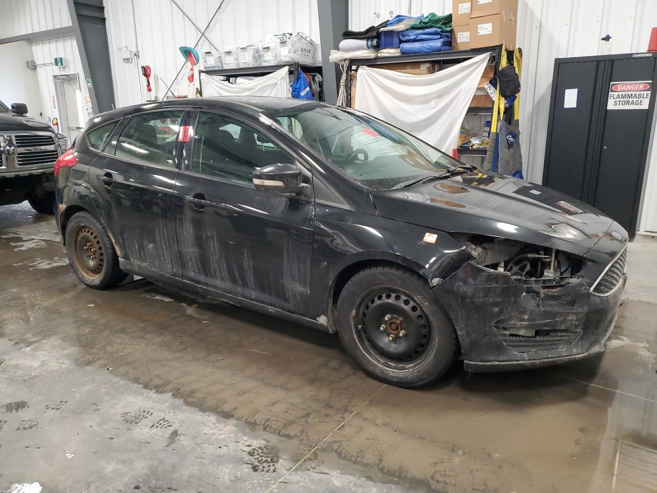 2015 Ford Focus VIN 1FADP3K2XFL359138 Copart auction photo, biohazard/chemical / front end damage thumbnail 4