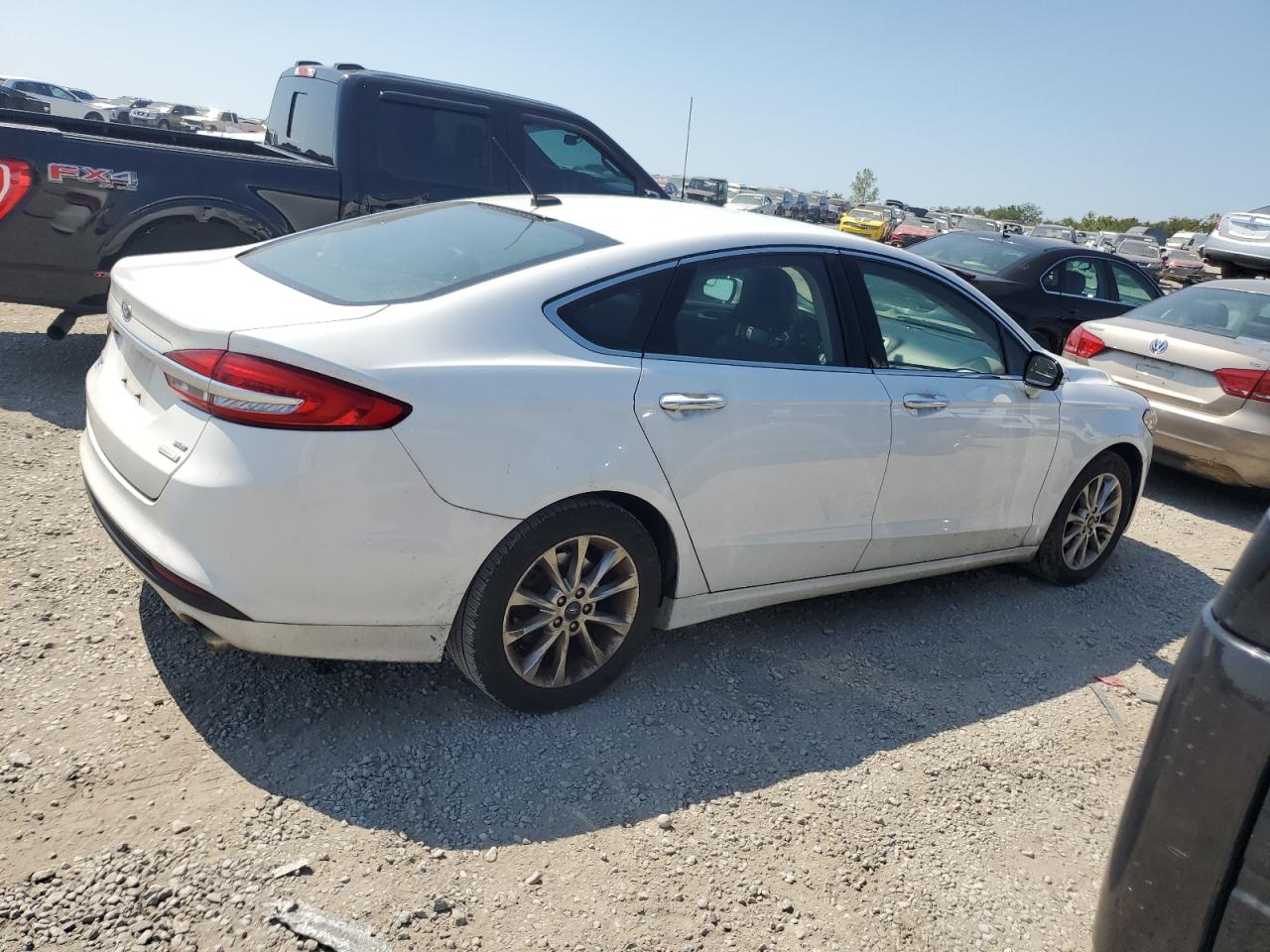 2017 Ford Fusion VIN 3FA6P0HDXHR319002 Copart auction photo, front end / side damage thumbnail 3