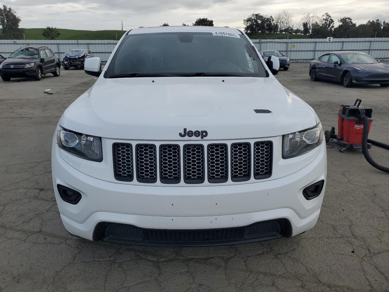 2015 Jeep Grand Cherokee VIN 1C4RJFAG4FC775251 Copart auction photo, vandalism damage thumbnail 5