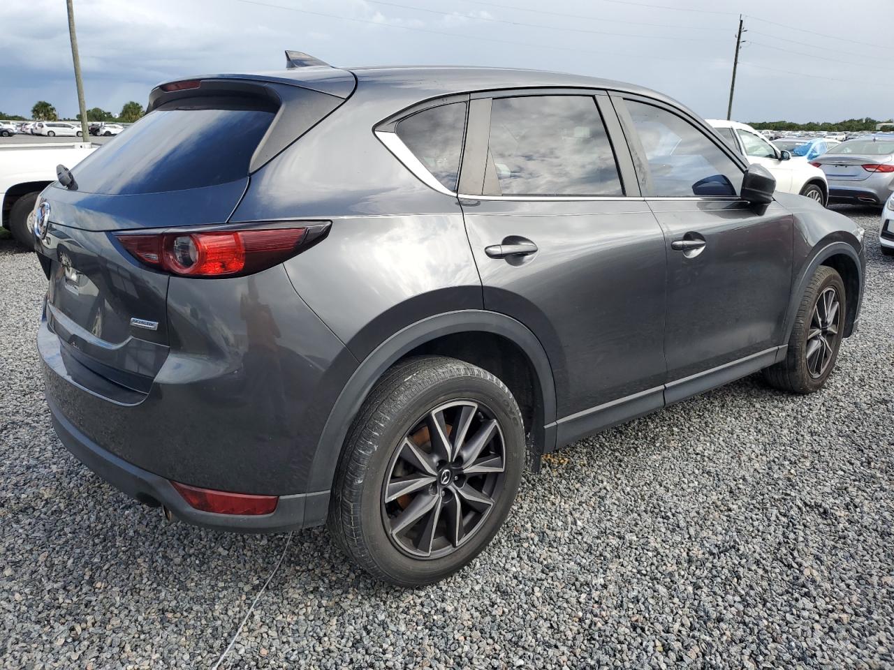 2018 Mazda CX-5 VIN JM3KFACM6J0398948 Copart auction photo, water/flood damage thumbnail 3