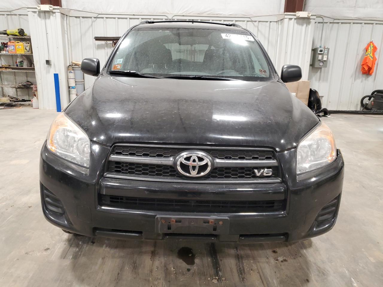 2012 Toyota RAV 4 VIN 2T3JK4DV6CW082747 Copart auction photo, side / front end damage thumbnail 5