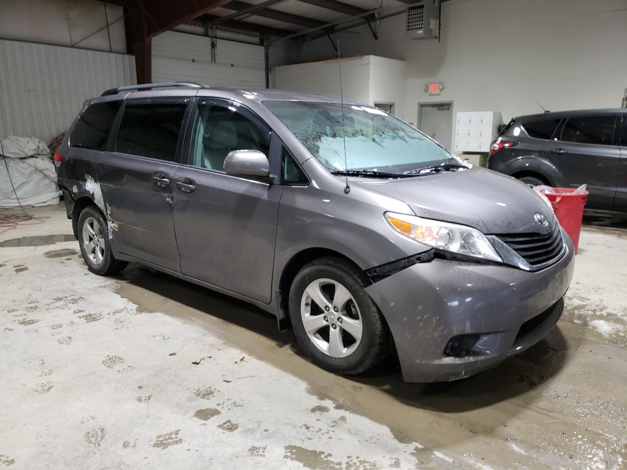 2014 Toyota Sienna VIN 5TDKK3DC2ES515630 Copart auction photo, all over damage thumbnail 4