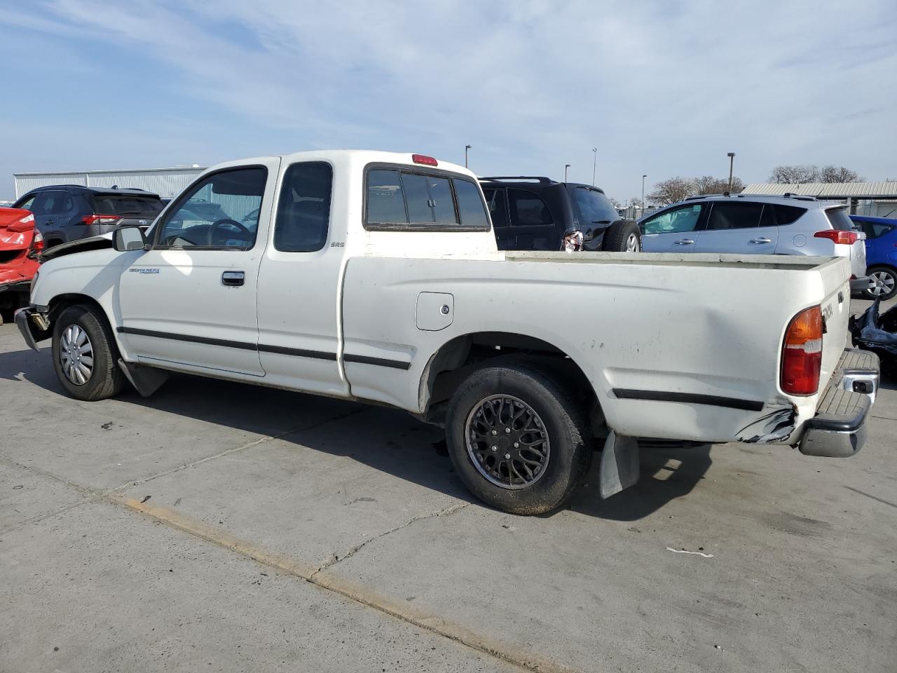 1998 Toyota Tacoma VIN 4TAVN52N9WZ112132 Copart auction photo, front end / rear end damage thumbnail 2