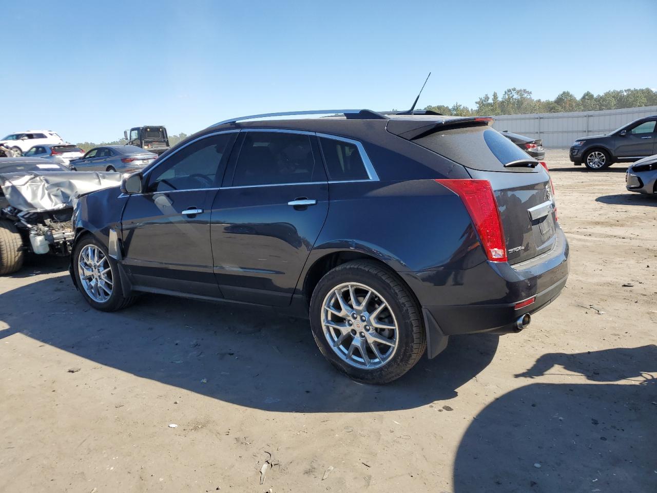 2014 Cadillac SRX VIN 3GYFNFE33ES560428 Copart auction photo, front end / minor dent/scratches damage thumbnail 2