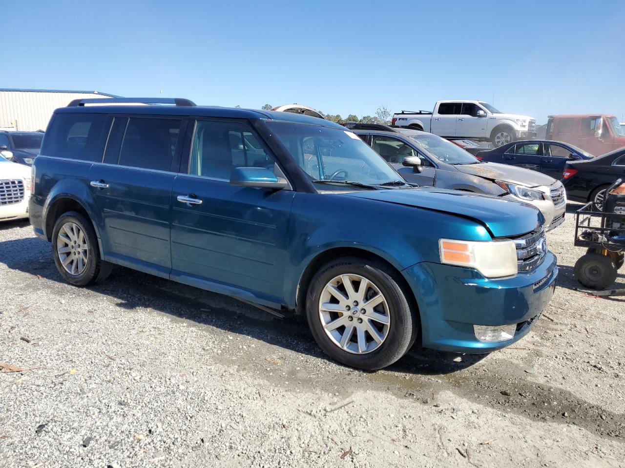 2011 Ford Flex VIN 2FMGK5CC1BBD08335 Copart auction photo, side damage thumbnail 4