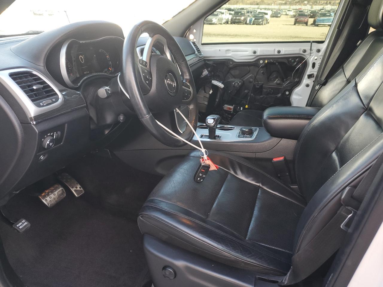 2015 Jeep Grand Cherokee VIN 1C4RJFCG8FC165785 Copart auction photo, front end / side damage thumbnail 7