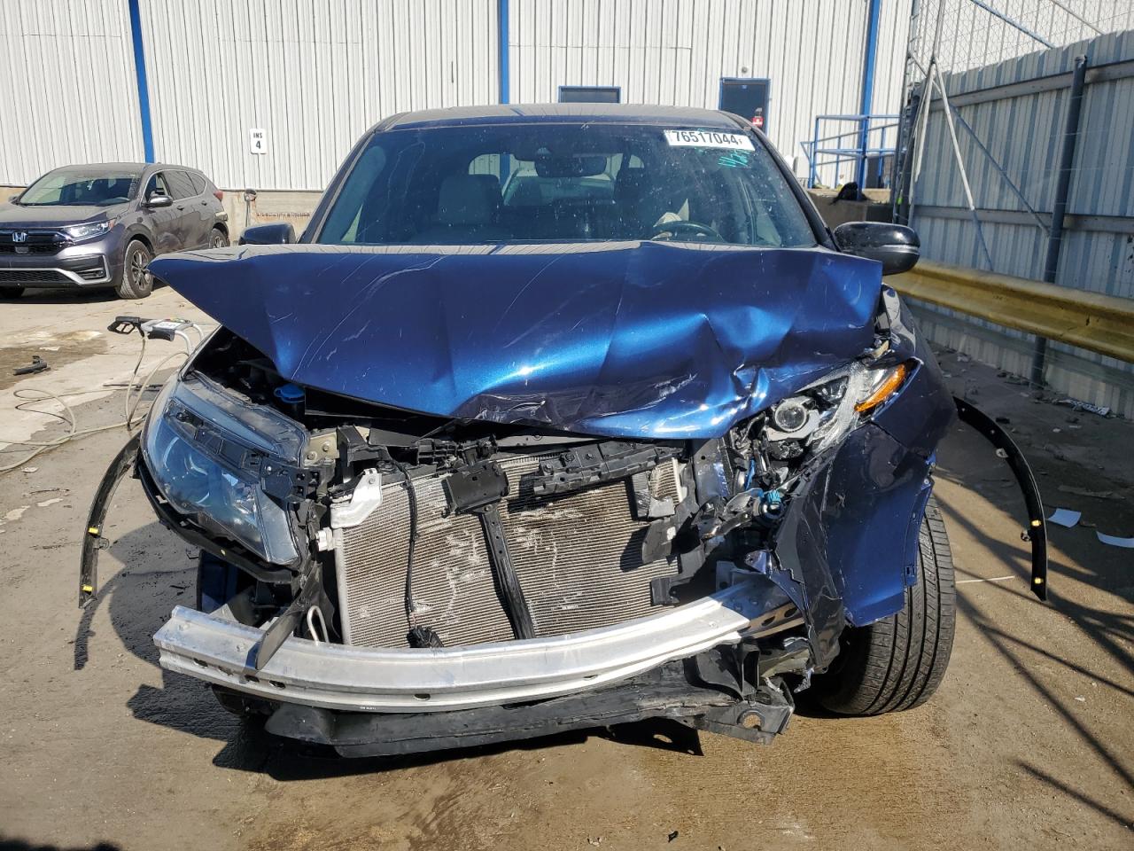 2019 Honda Passport VIN 5FNYF8H5XKB010717 Copart auction photo, front end / side damage thumbnail 5