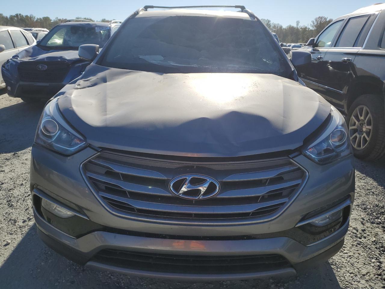 2017 Hyundai Santa Fe VIN 5NMZU3LB0HH002871 Copart auction photo, rear end / front end damage thumbnail 5