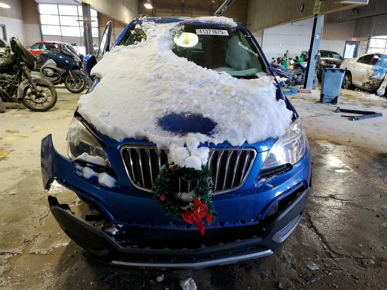 2015 Buick Encore VIN KL4CJASBXFB138117 Copart auction photo, front end / side damage thumbnail 5