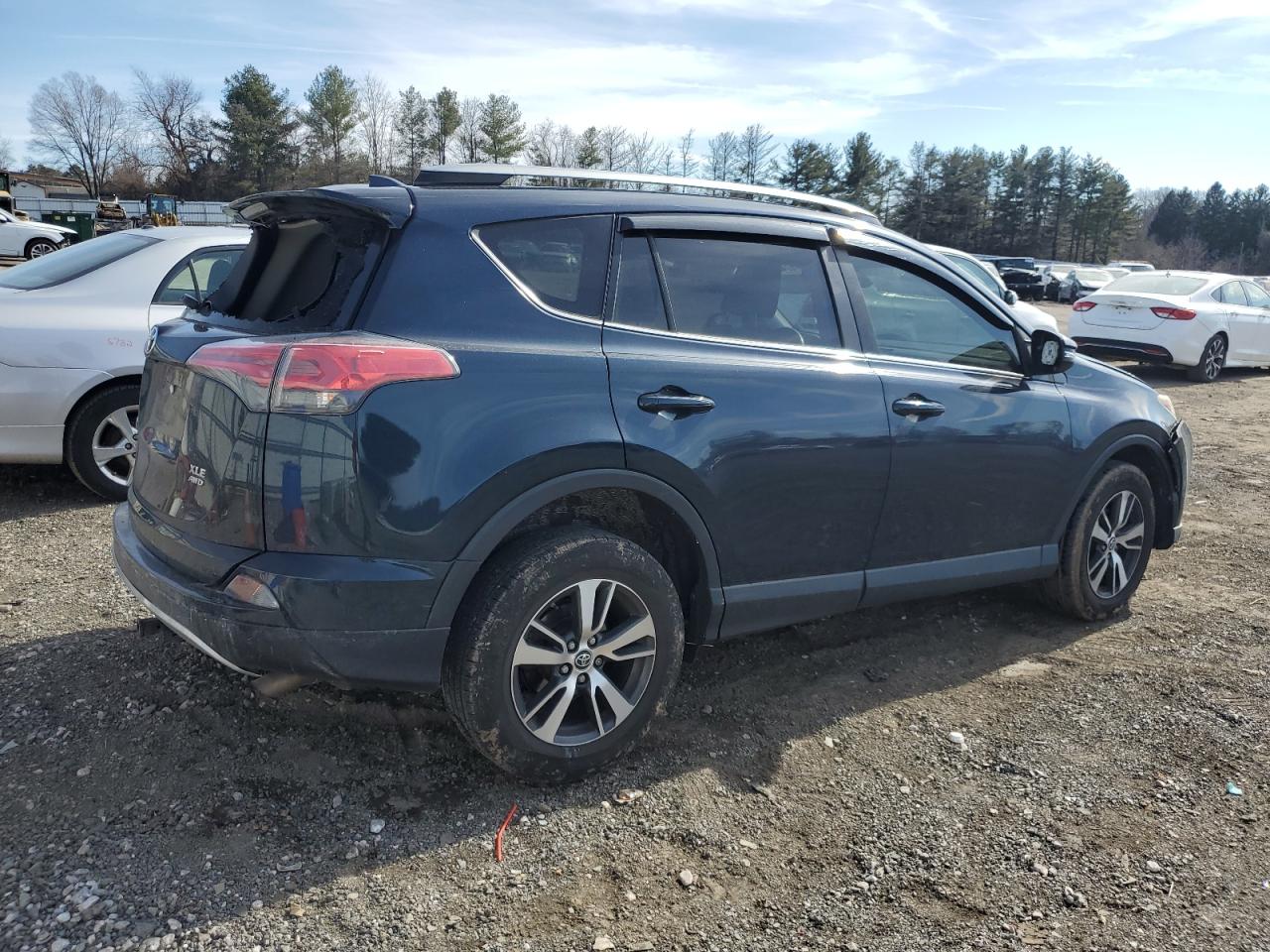 2017 Toyota RAV 4 VIN JTMRFREV7HJ701171 Copart auction photo, front end / top/roof damage thumbnail 3