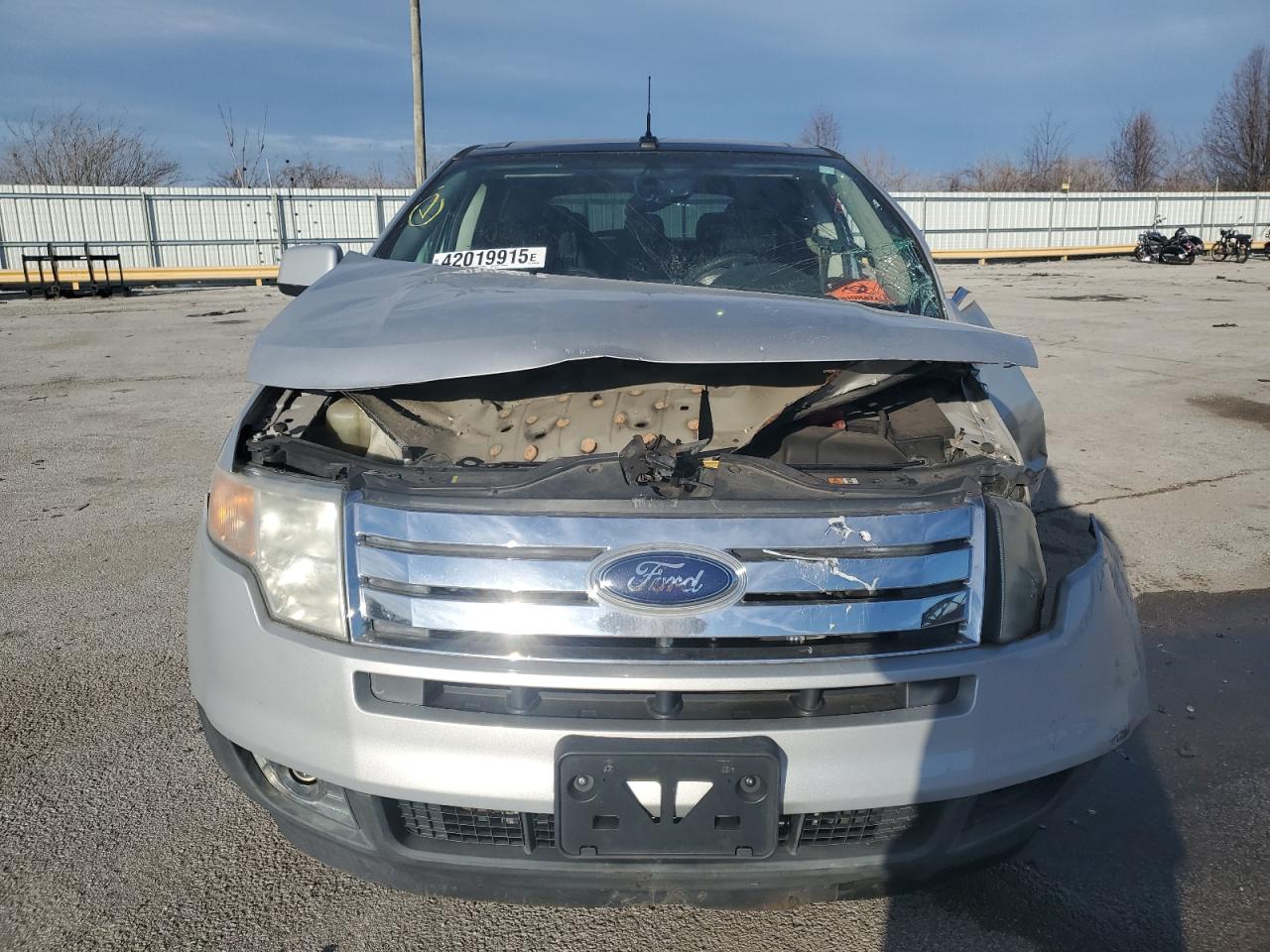 2009 Ford Edge VIN 2FMDK39CX9BA57775 Copart auction photo, side / front end damage thumbnail 5