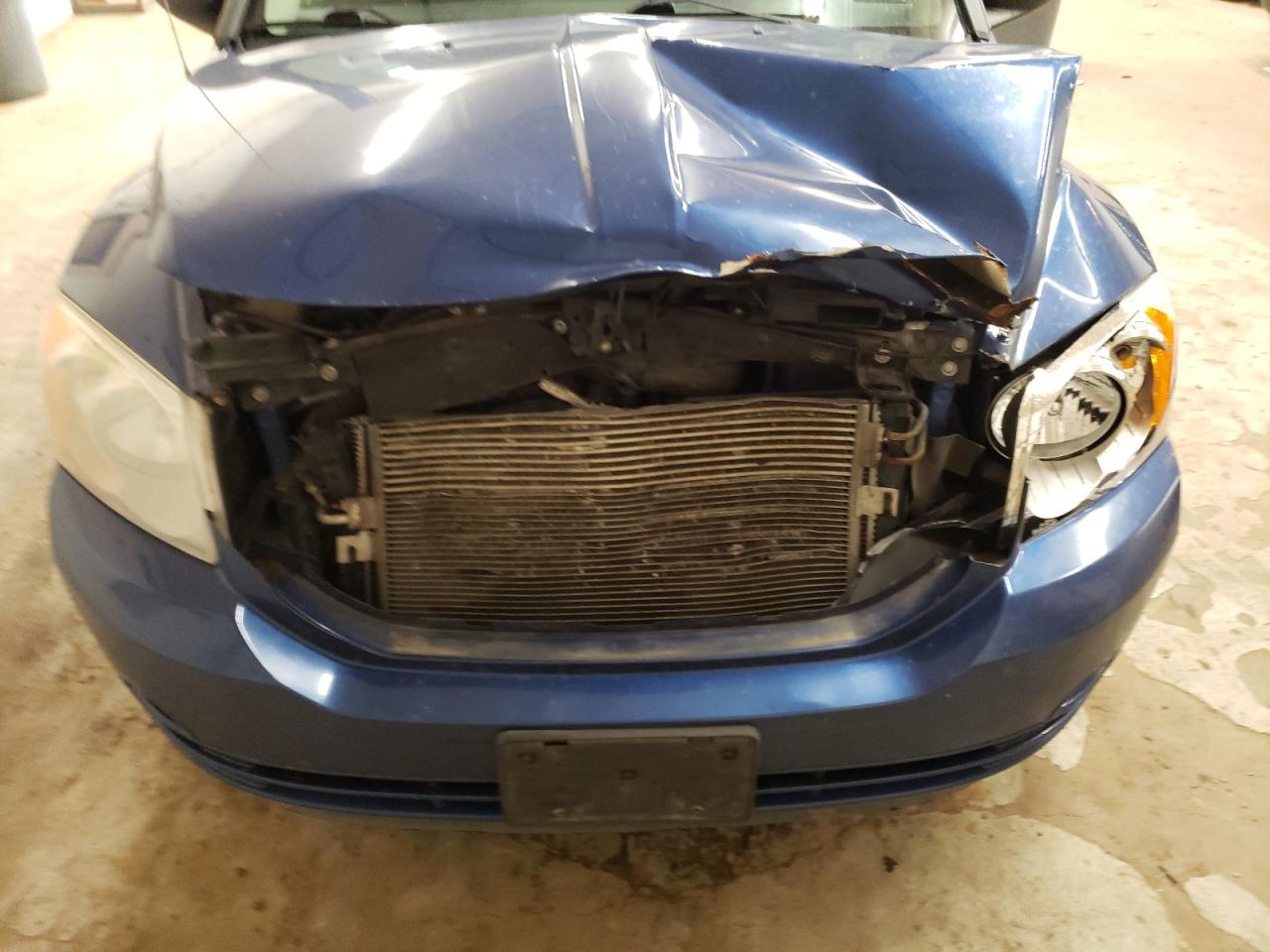 2009 Dodge Caliber VIN 1B3HB48A99D143909 Copart auction photo, front end damage thumbnail 12