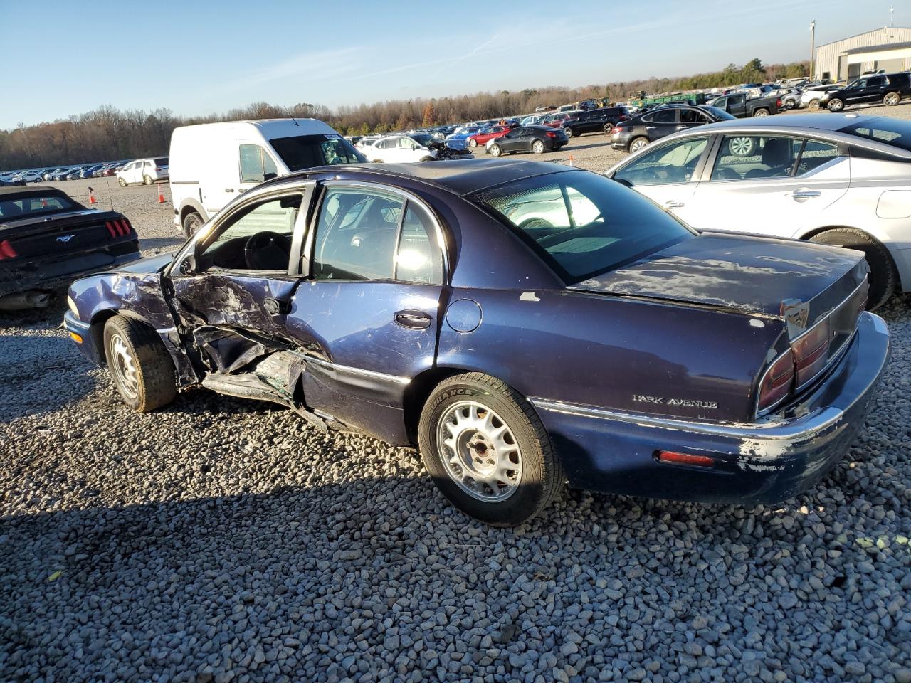1999 Buick Park Avenue VIN 1G4CW52K7X4639143 Copart auction photo, all over damage thumbnail 2