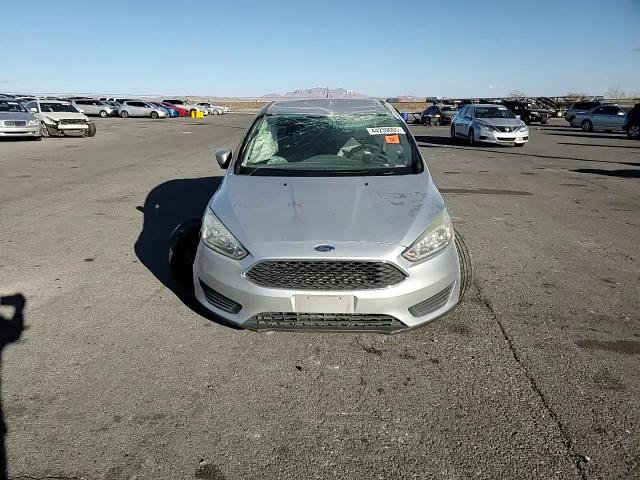 2016 Ford Focus VIN 1FADP3F26GL289830 Copart auction photo, all over damage thumbnail 11