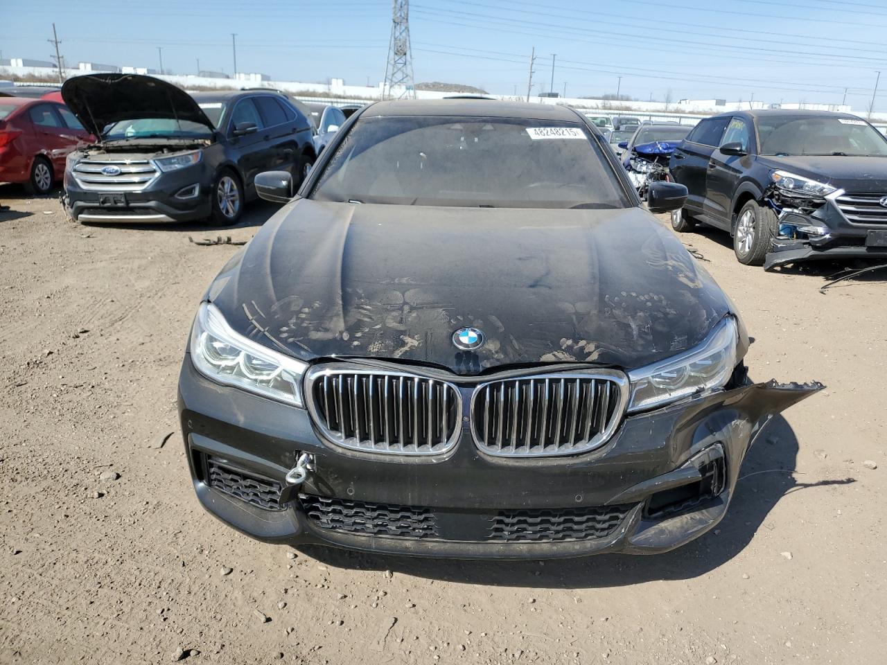 2016 BMW 7er VIN WBA7F2C58GG416375 Copart auction photo, front end / minor dent/scratches damage thumbnail 5