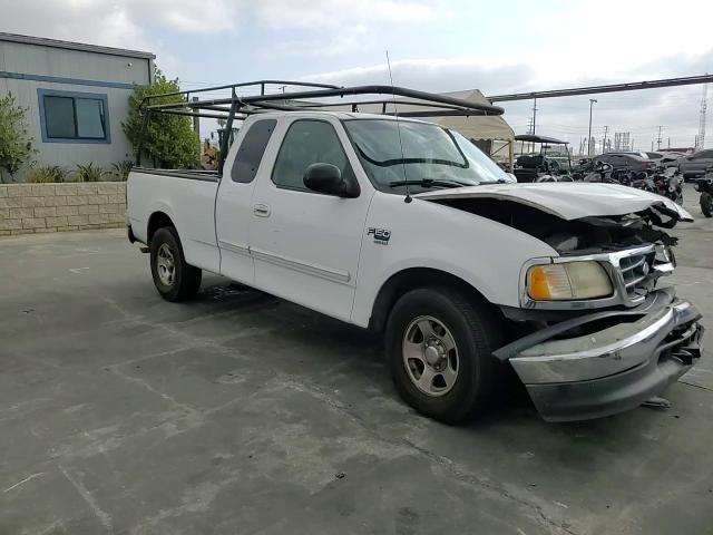 2002 Ford F-150 VIN 1FTRX17L22NB89703 Copart auction photo, front end / mechanical damage thumbnail 10