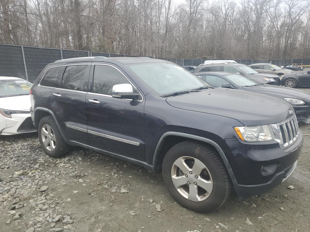2011 Jeep Grand Cherokee VIN 1J4RR5GG3BC703309 Copart auction photo, minor dent/scratches damage thumbnail 4