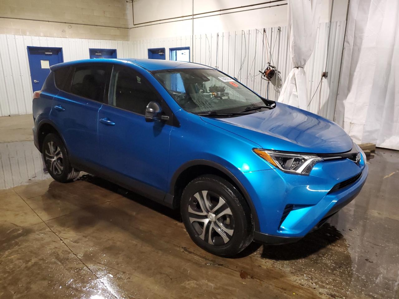 2018 Toyota RAV 4 VIN 2T3BFREV4JW807005 Copart auction photo, front end / side damage thumbnail 4