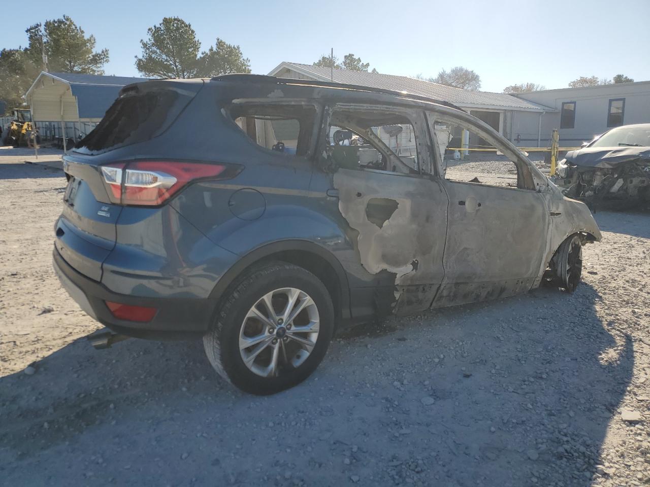 2018 Ford Escape VIN 1FMCU9GD7JUA29659 Copart auction photo, burn damage thumbnail 3