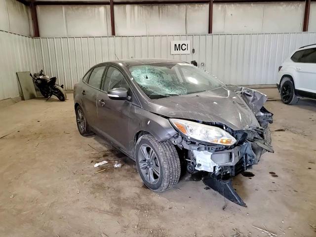 2014 Ford Focus VIN 1FADP3F24EL370385 Copart auction photo, rollover damage thumbnail 11