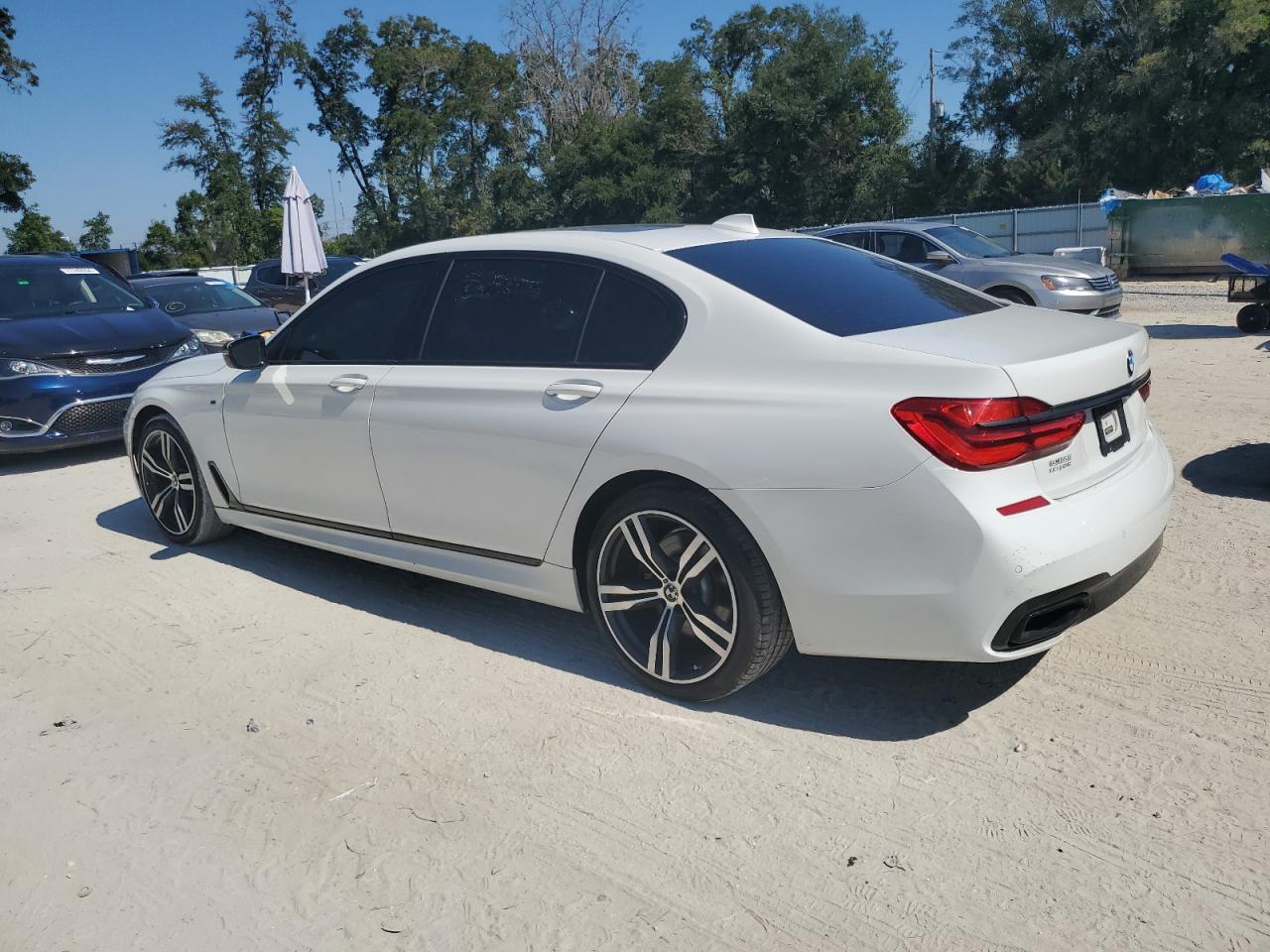 2016 BMW 7er VIN WBA7E2C56GG738726 Copart auction photo, normal wear damage thumbnail 2
