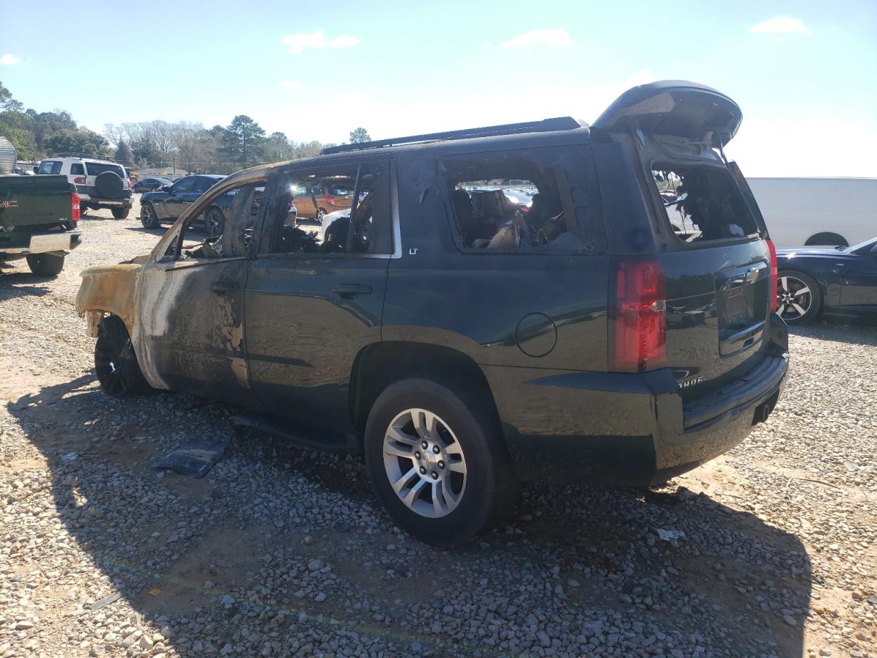 2016 Chevrolet Tahoe VIN 1GNSCBKC9GR434238 Copart auction photo, burn damage thumbnail 2