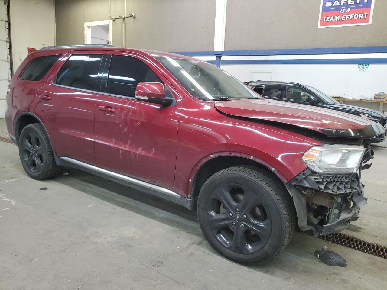 2015 Dodge Durango VIN 1C4RDJDGXFC850203 Copart auction photo, front end / side damage thumbnail 4