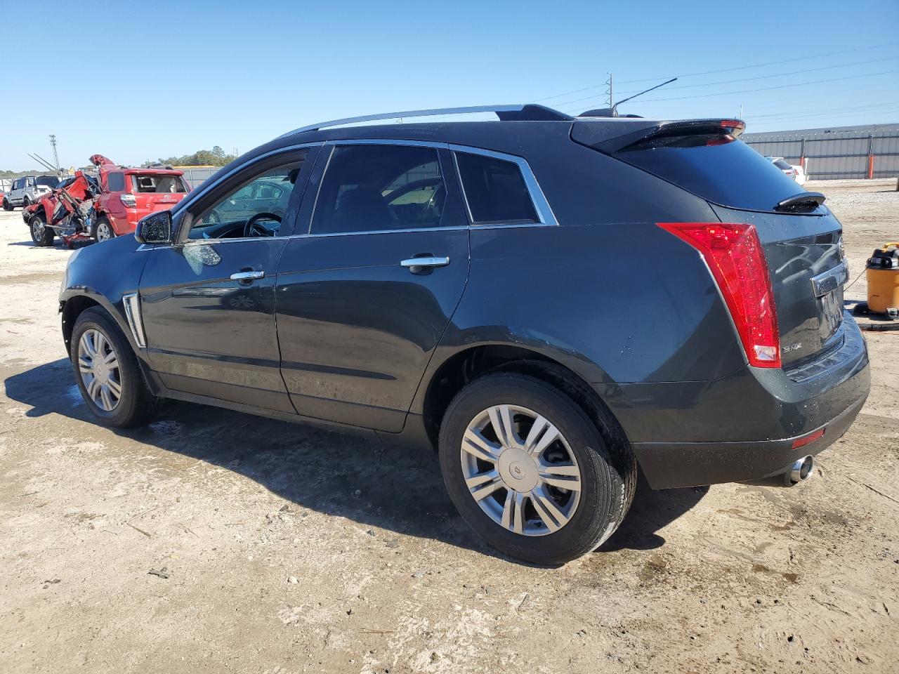 2015 Cadillac SRX VIN 3GYFNBE35FS599208 Copart auction photo, front end damage thumbnail 2