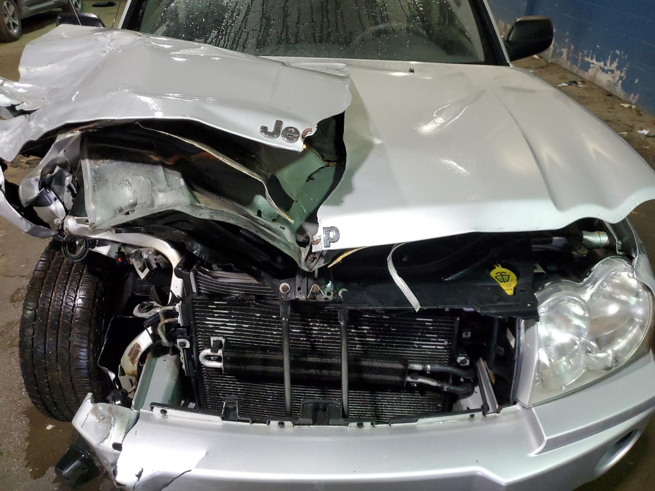 2007 Jeep Grand Cherokee VIN 1J8GR48K77C500465 Copart auction photo, front end damage thumbnail 12