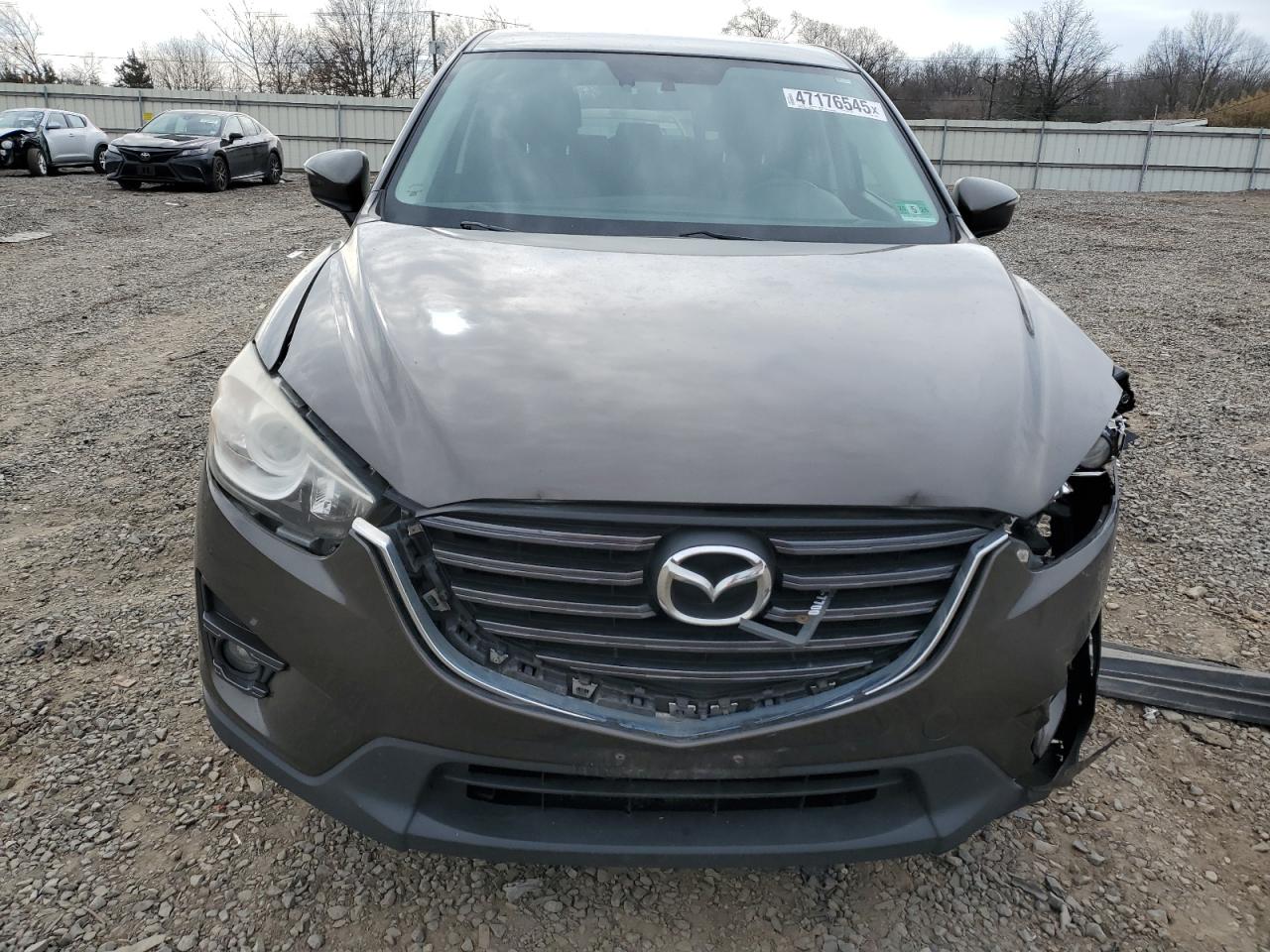 2016 Mazda CX-5 VIN JM3KE4DY2G0763835 Copart auction photo, front end damage thumbnail 5
