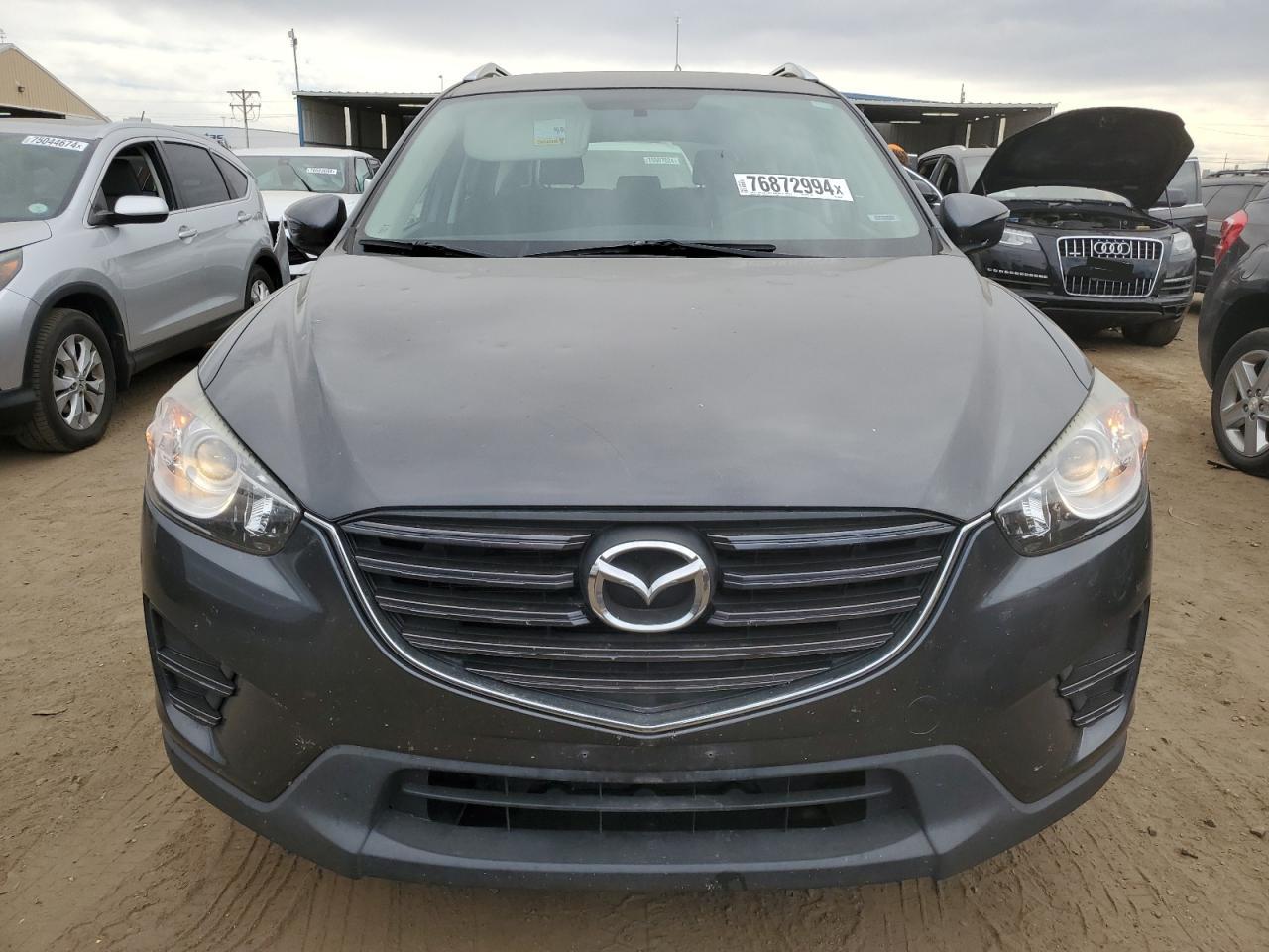 2016 Mazda CX-5 VIN JM3KE4BY6G0882393 Copart auction photo, hail damage thumbnail 5