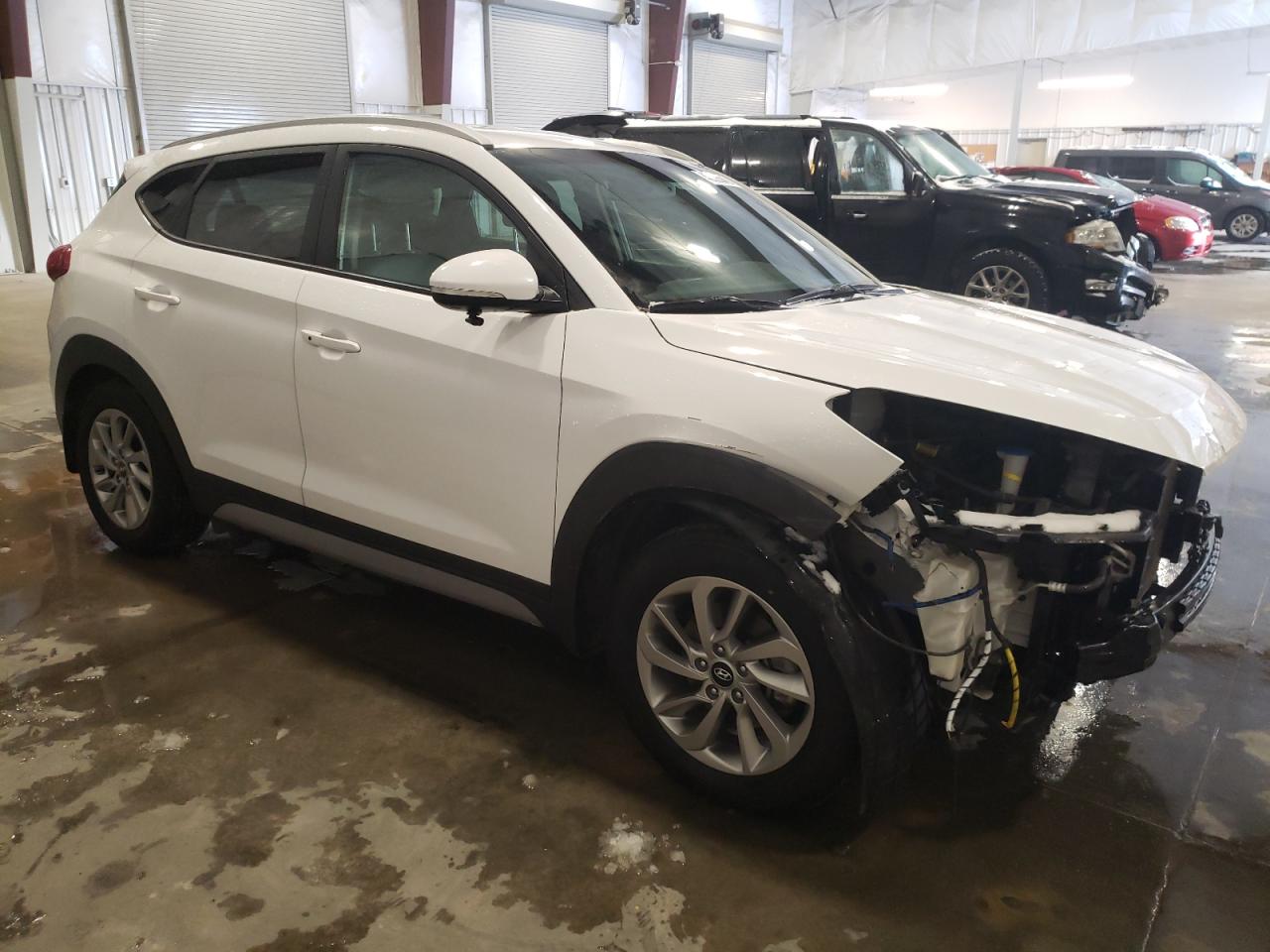 2018 Hyundai Tucson VIN KM8J3CA49JU603677 Copart auction photo, front end damage thumbnail 4