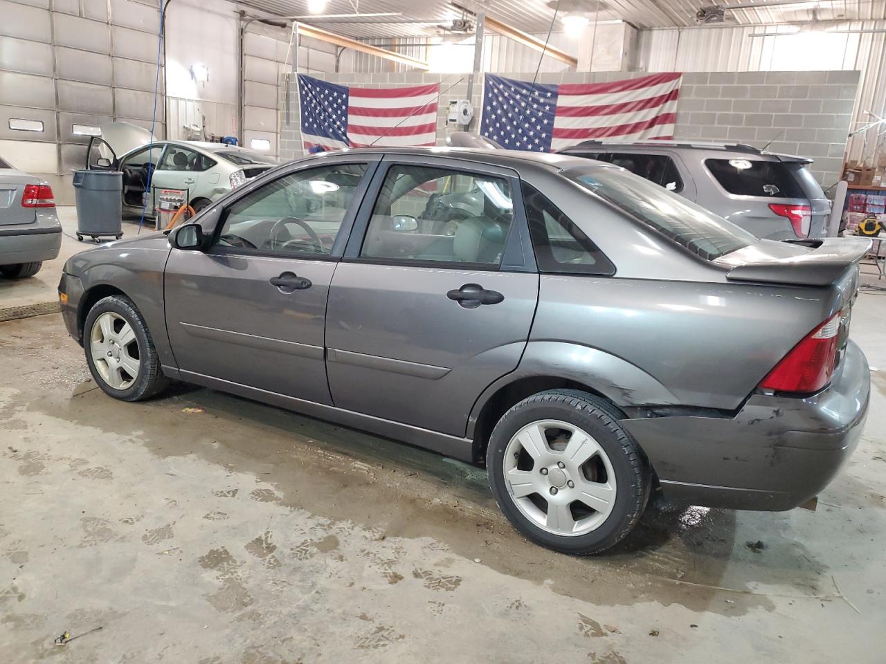2006 Ford Focus VIN 1FAFP34N66W169254 Copart auction photo, rear end / side damage thumbnail 2