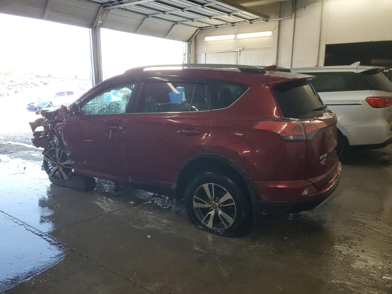 2018 Toyota RAV 4 VIN 2T3WFREV5JW495584 Copart auction photo, front end / side damage thumbnail 2