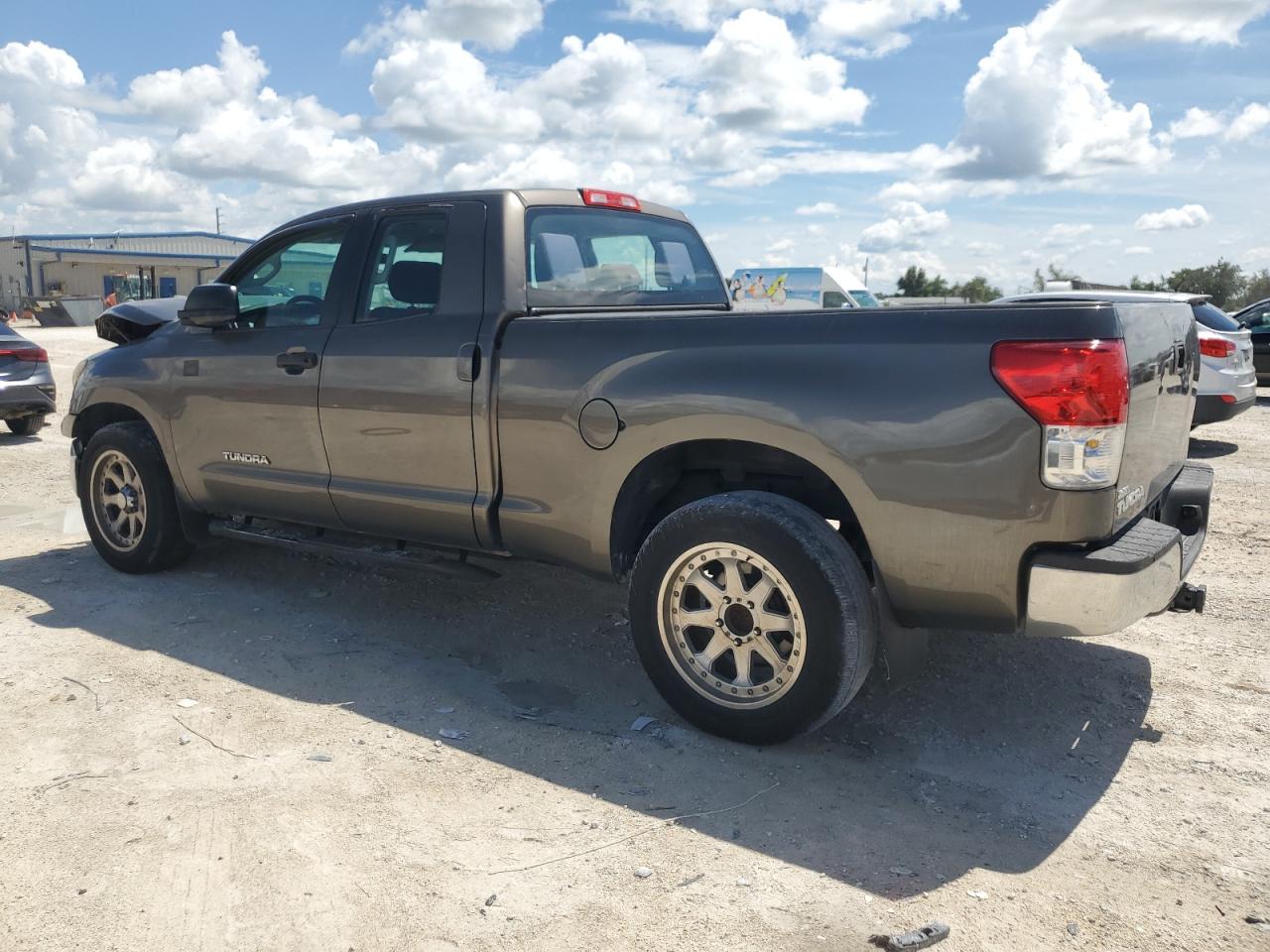 2011 Toyota Tundra VIN 5TFRU5F19BX024574 Copart auction photo, front end / minor dent/scratches damage thumbnail 2