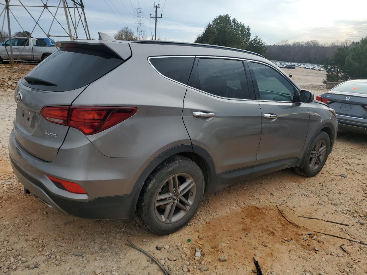 2017 Hyundai Santa Fe VIN 5NMZU3LB1HH027651 Copart auction photo, front end damage thumbnail 3