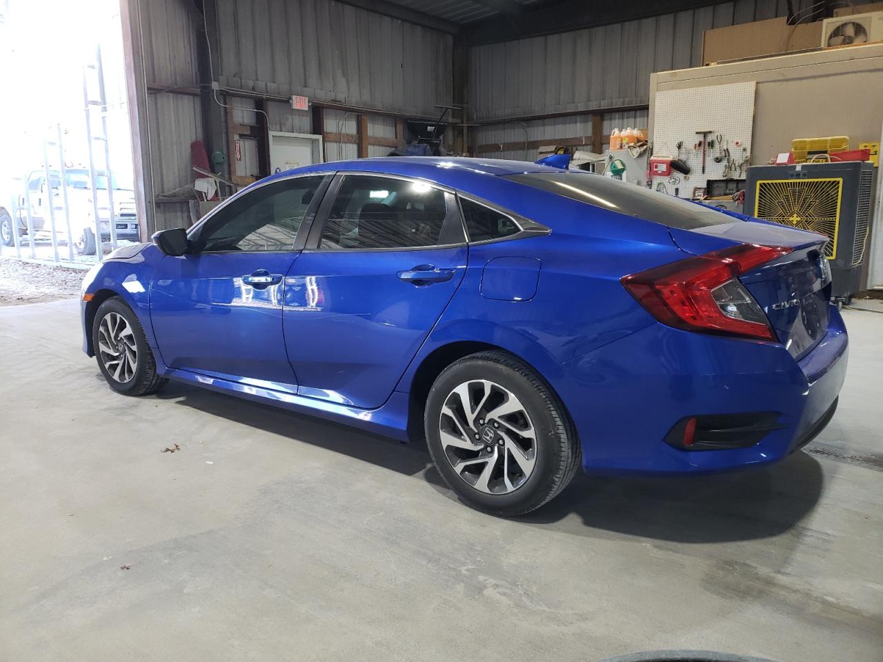 2018 Honda Civic VIN 19XFC2F79JE022962 Copart auction photo, front end / minor dent/scratches damage thumbnail 2