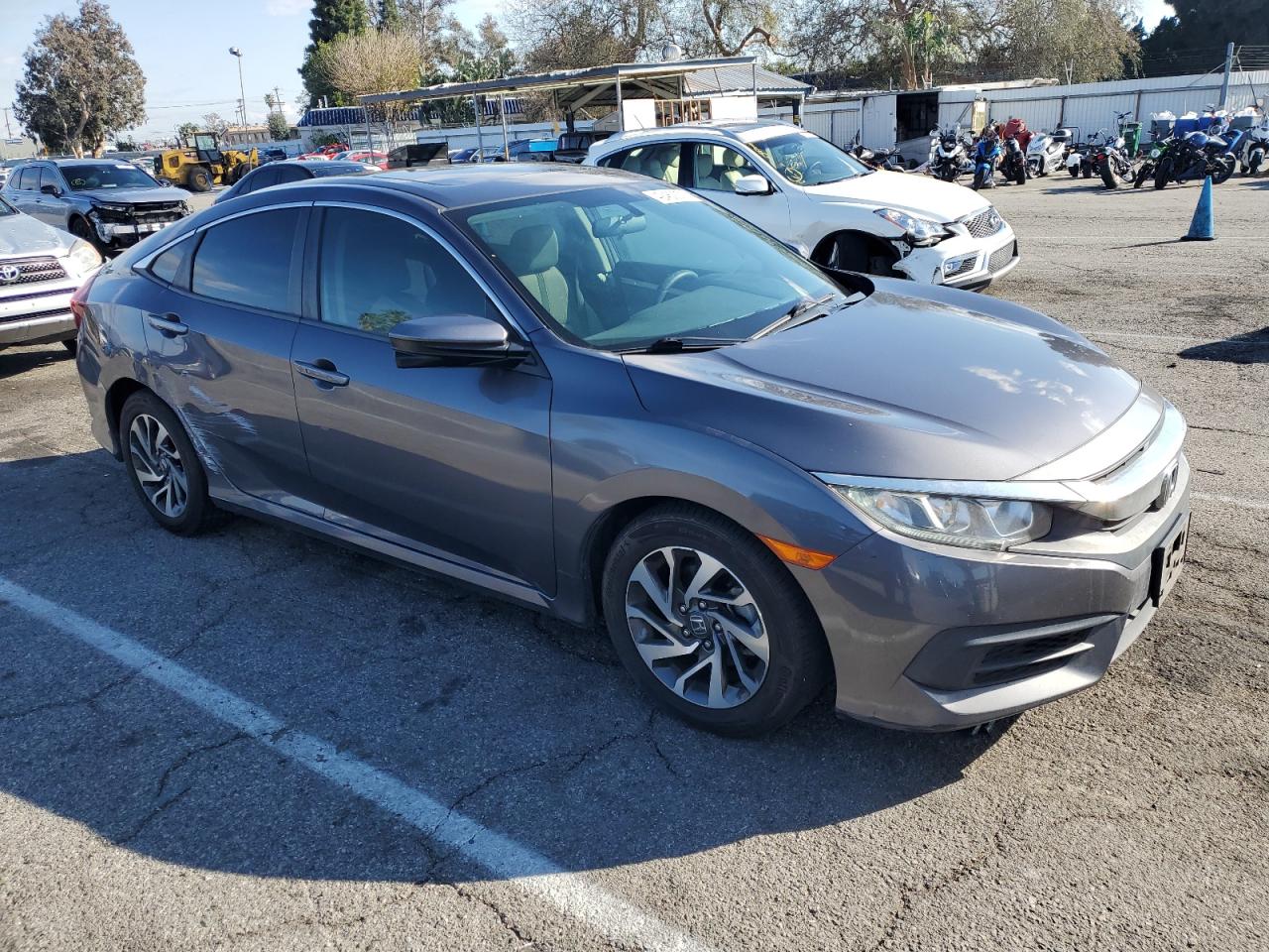 2016 Honda Civic VIN 2HGFC2F77GH562244 Copart auction photo, side / minor dent/scratches damage thumbnail 4