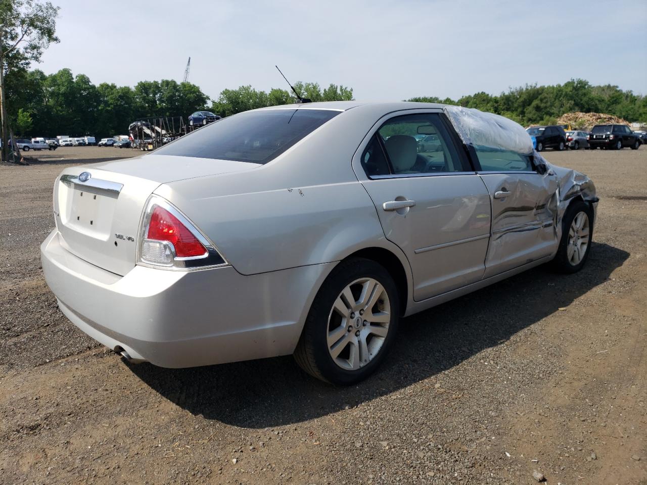 2009 Ford Fusion VIN 3FAHP08159R113232 Copart auction photo, front end / side damage thumbnail 3