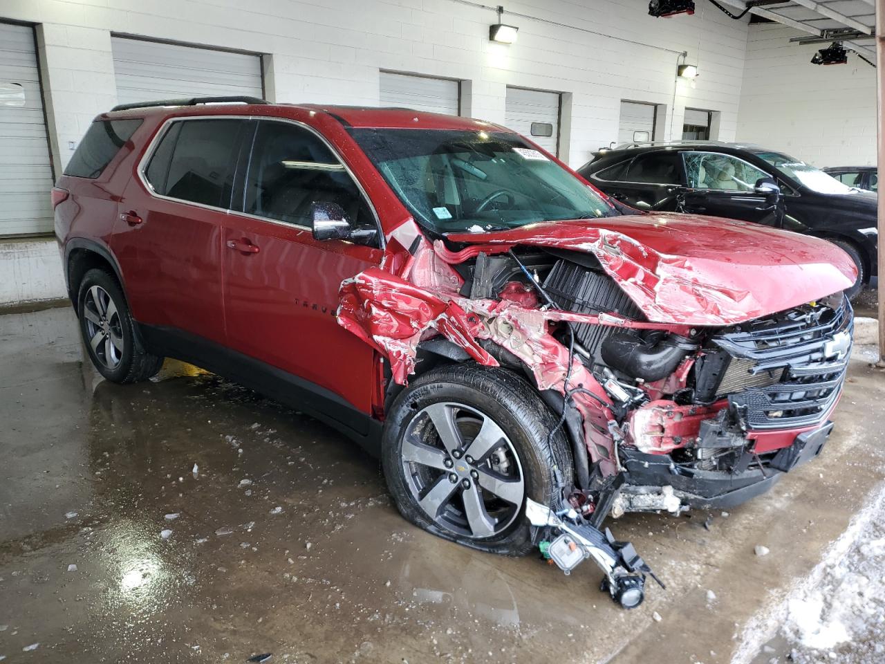 2020 Chevrolet Traverse VIN 1GNEVHKWXLJ321380 Copart auction photo, front end / side damage thumbnail 4