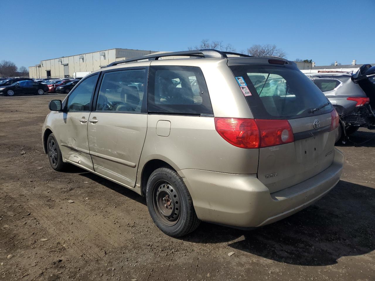 2010 Toyota Sienna VIN 5TDKK4CC7AS309009 Copart auction photo, side damage thumbnail 2