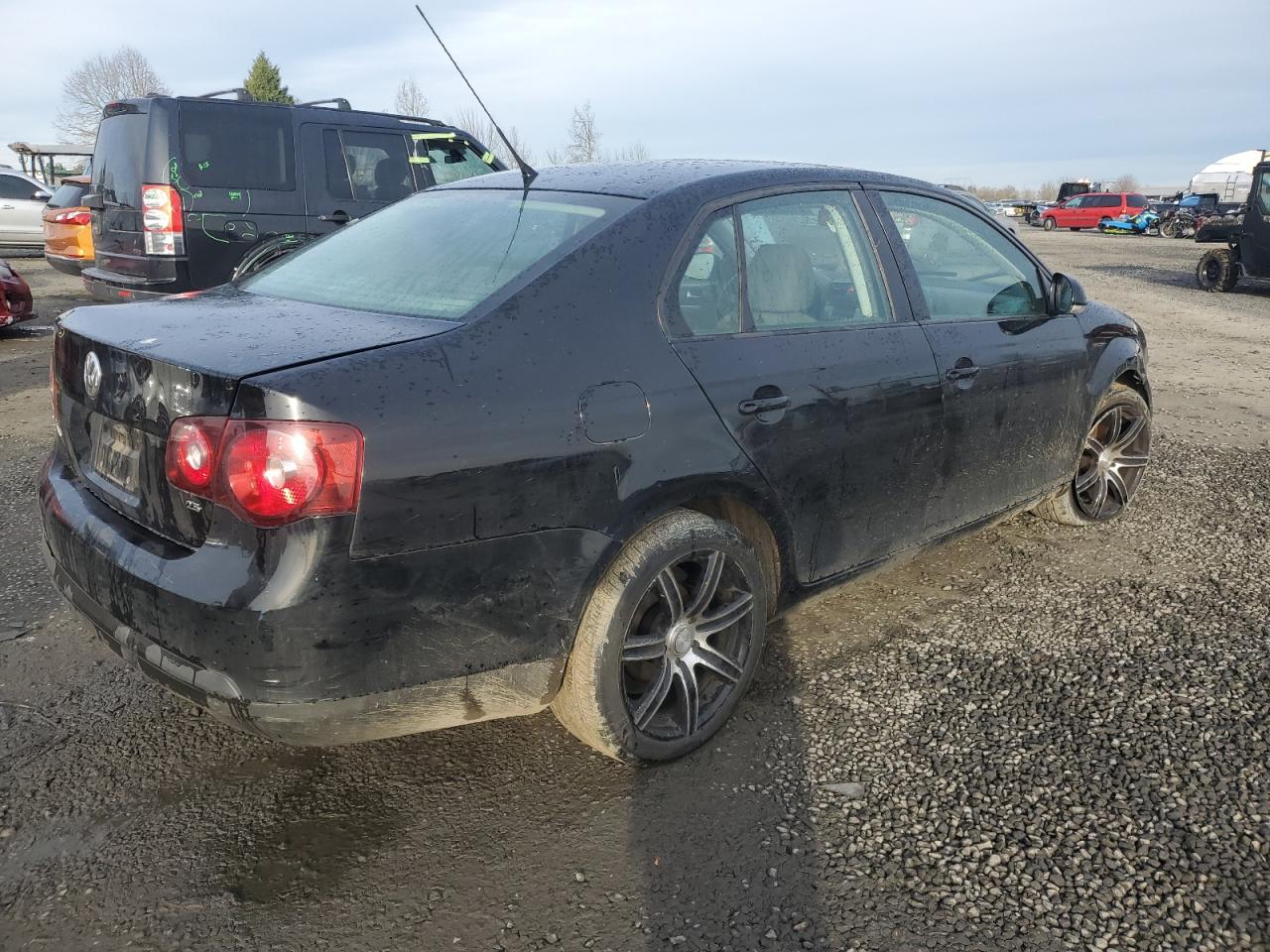 2009 Volkswagen Jetta VIN 3VWJZ71K29M153392 Copart auction photo, front end / rear end damage thumbnail 3
