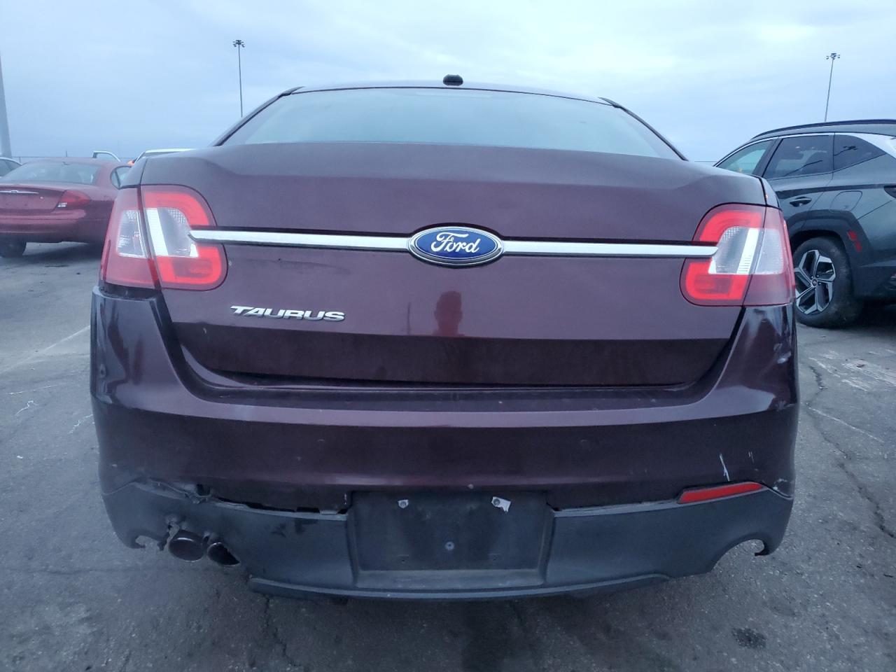 2012 Ford Taurus VIN 1FAHP2DW2CG140478 Copart auction photo, all over damage thumbnail 6