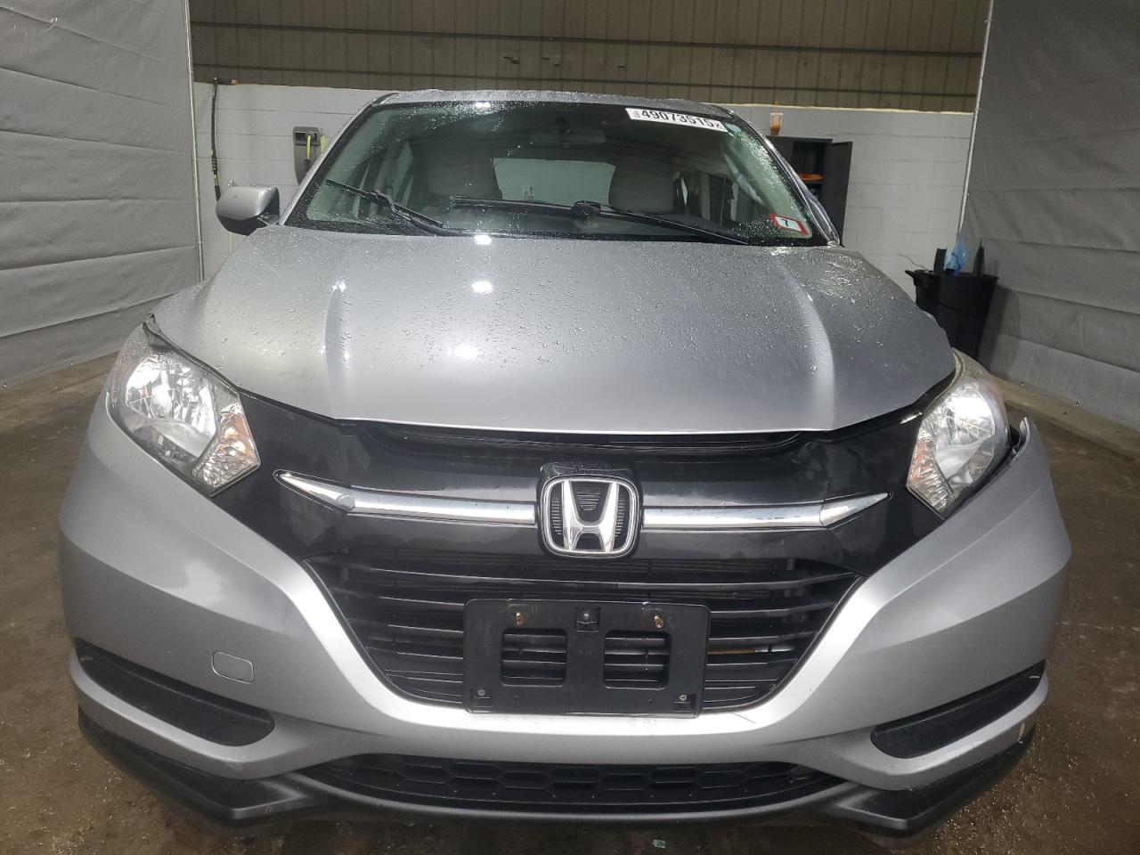 2018 Honda HR-V VIN 3CZRU6H33JG708523 Copart auction photo, side / front end damage thumbnail 5