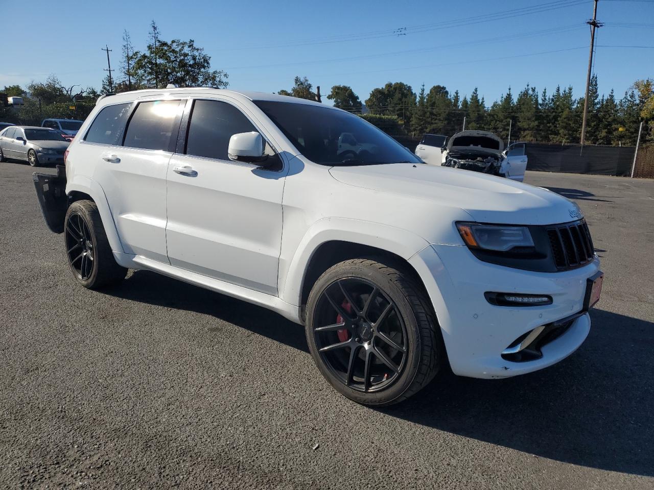 2015 Jeep Grand Cherokee VIN 1C4RJFDJ4FC213146 Copart auction photo, rear end / side damage thumbnail 4