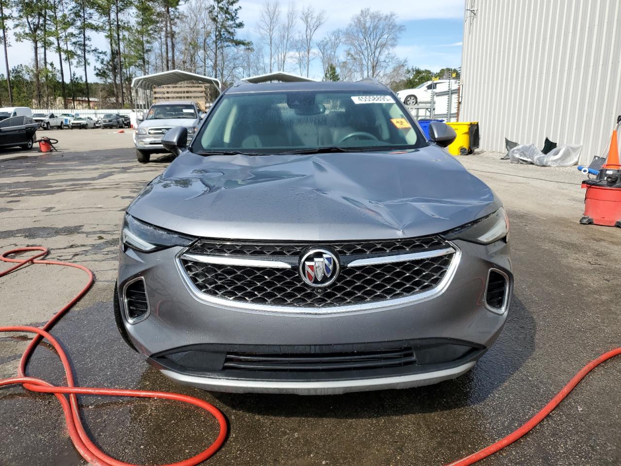 2022 Buick Envision VIN LRBFZRR46ND020181 Copart auction photo, top/roof / water/flood damage thumbnail 5