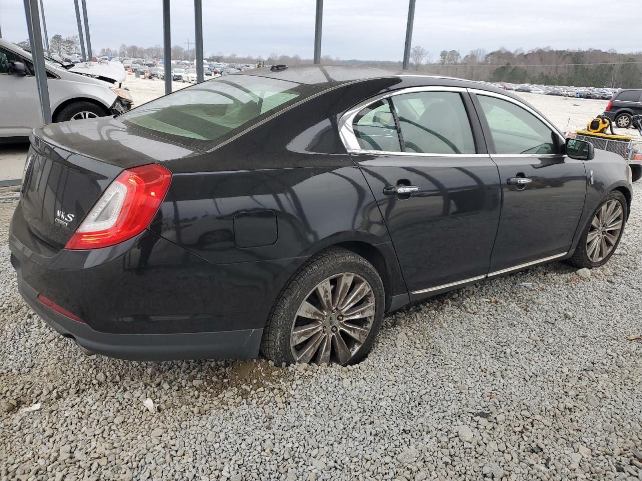 2014 Lincoln MKS VIN 1LNHL9FT5EG601141 Copart auction photo, all over damage thumbnail 3