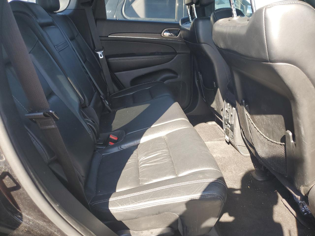 2015 Jeep Grand Cherokee VIN 1C4RJFBG7FC697479 Copart auction photo, front end / hail damage thumbnail 12
