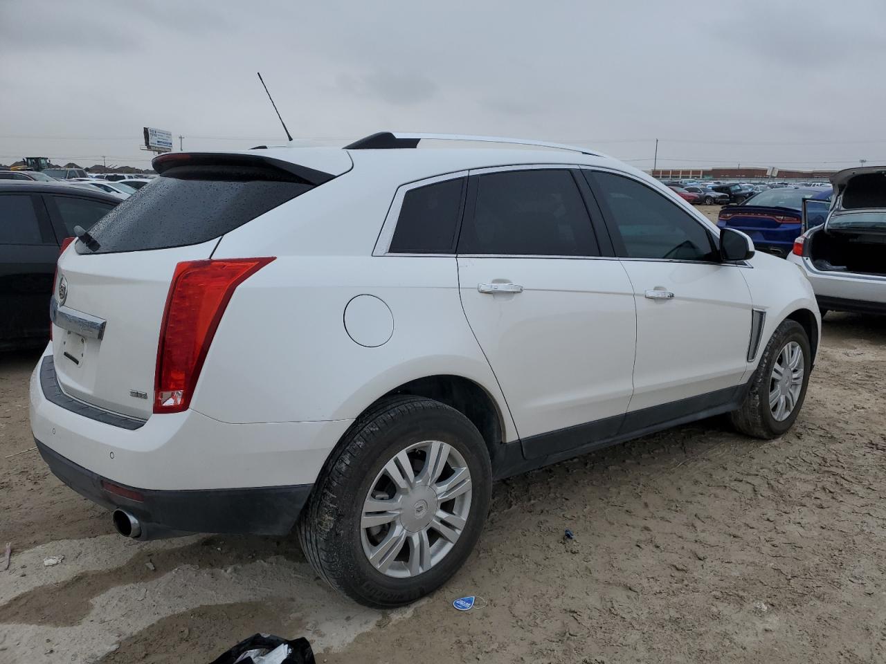 2016 Cadillac SRX VIN 3GYFNBE31GS506329 Copart auction photo, top/roof damage thumbnail 3